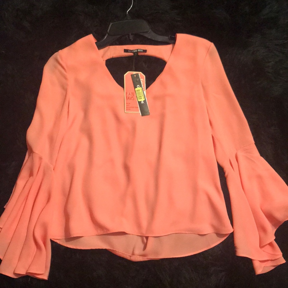 Gianni Bini, it’s a peachy kind of color. NEW!